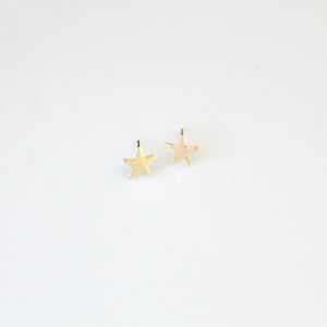 gold star earrings by little hawk jewelry